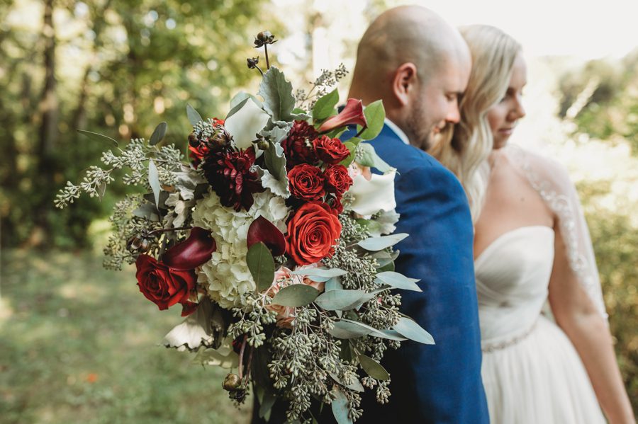 wine colored roses wedding bouquet with lambs ear and eucalyptus at Butler Ohio Wedding Photos