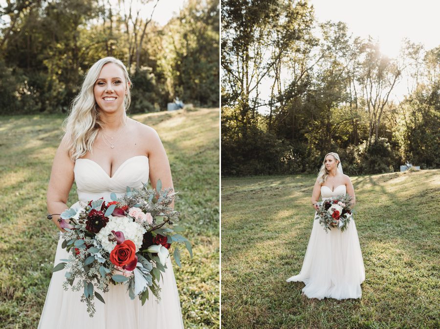 bride looking over shoulder while standing by a hill