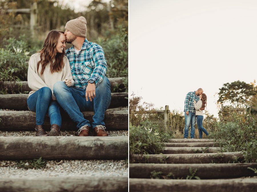 groom to be kissing fiancés forehead while sitting on steps for Engagement Photos at Grange Audubon