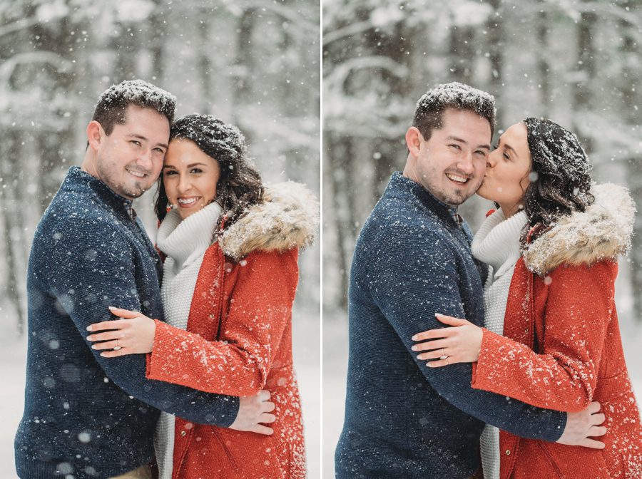 woman kissing fiancé on the cheek in the snow at Hoover Reservoir Engagement