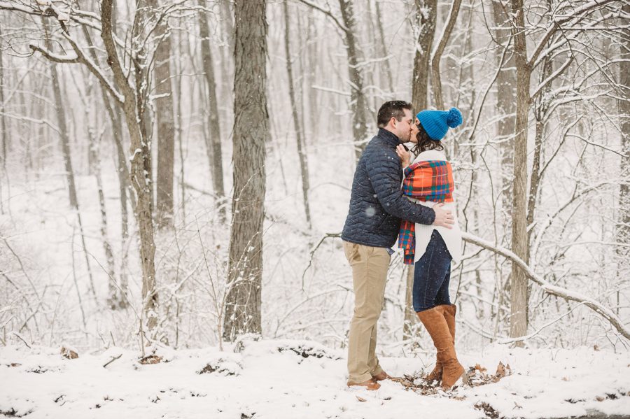 winter Ohio photo of engaged couple kissing at Hoover Reservoir Engagement