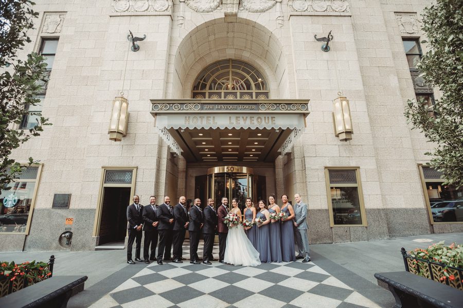 wedding party in front of downtown Columbus ohio hotel leveque