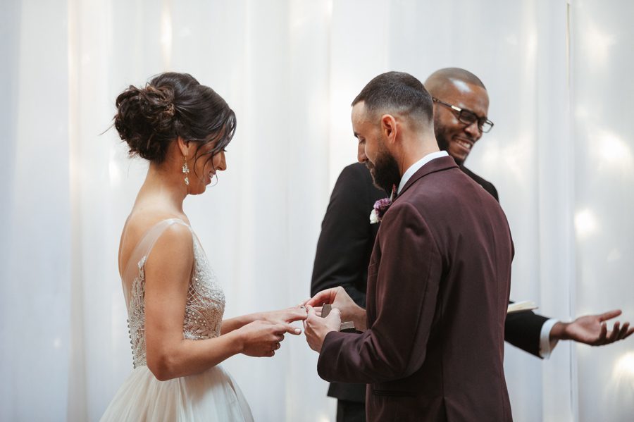 bride and groom exchange of rings