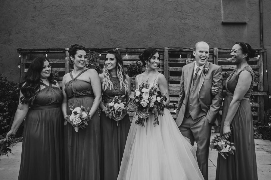 black and white photo of bride with bridal party