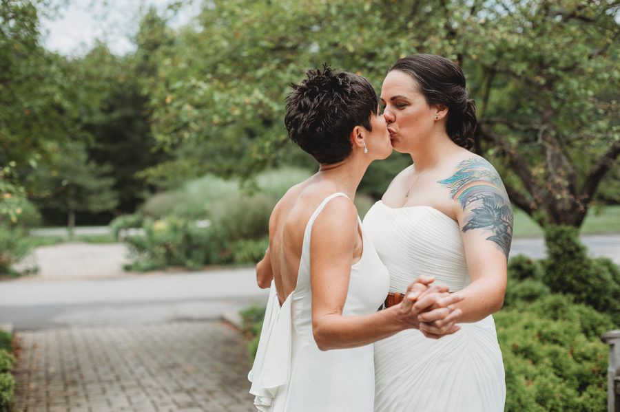 same sex female couple kissing
