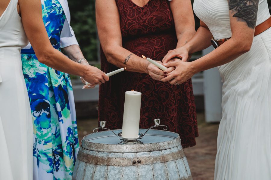 mothers of brides and brides lighting unity candle