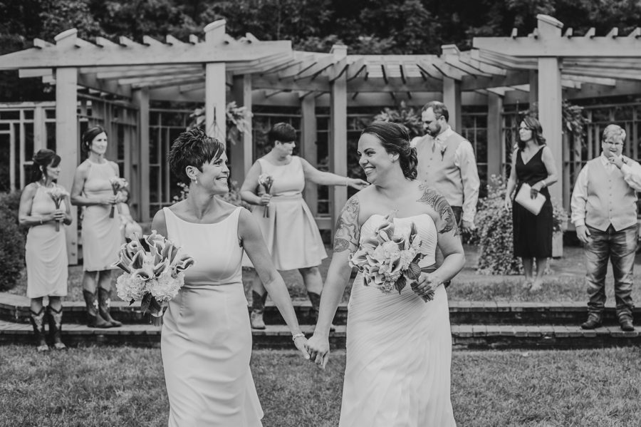 same sex female couple recessional at wedding