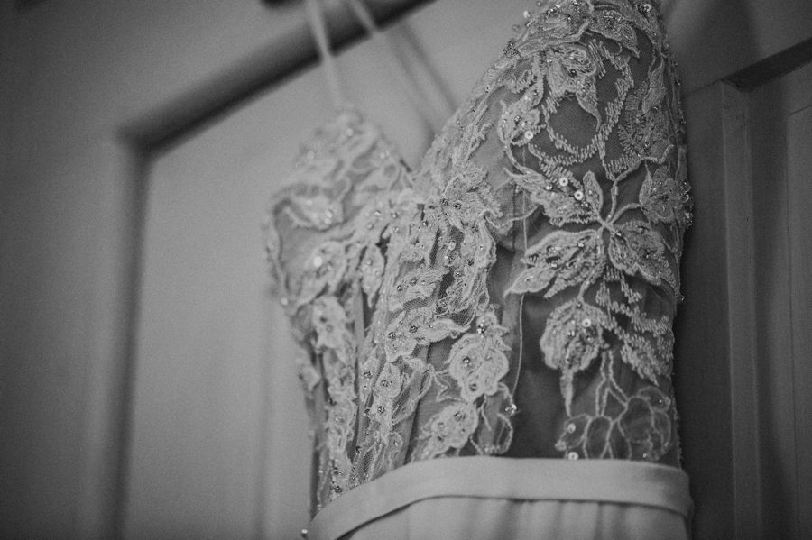 black and white detail photo of wedding dress lace