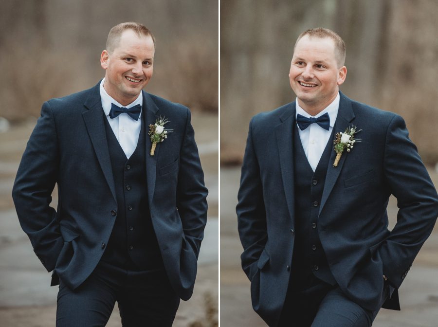 groom smiling with hands in pockets