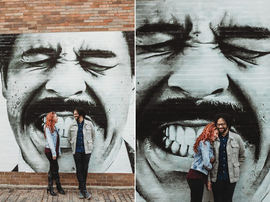 engaged couple in front of Richard Pryor mural in Columbus Ohio