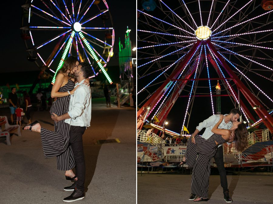 engaged couple dip kissing in front of ferris wheel at Ohio State Fair