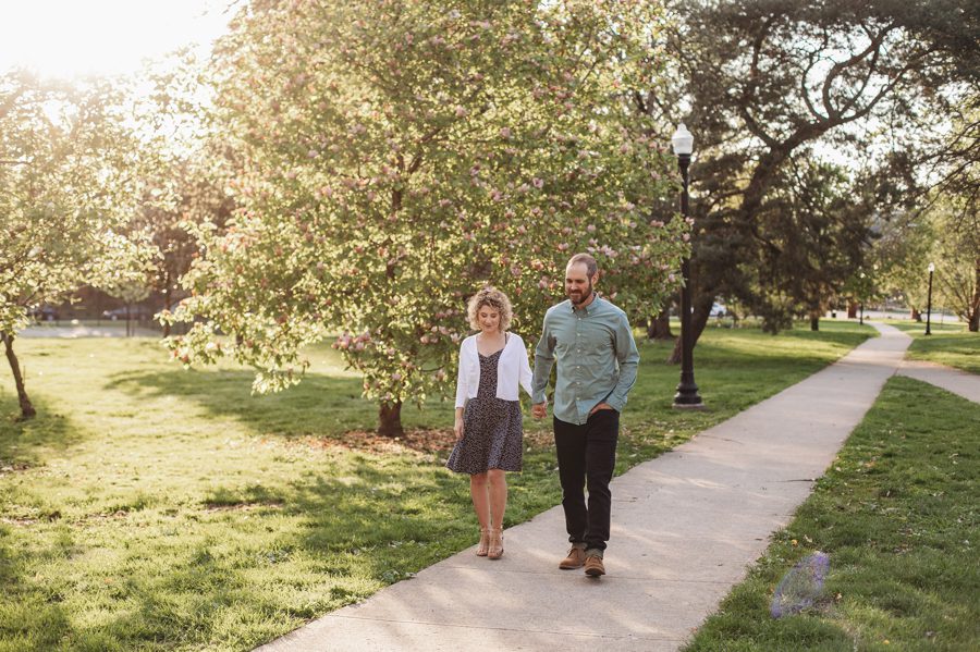 engaged couple walking path at Columbus Ohio park