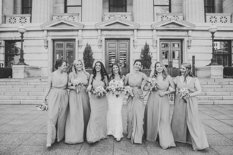 candid black and white image of bridesmaids walking