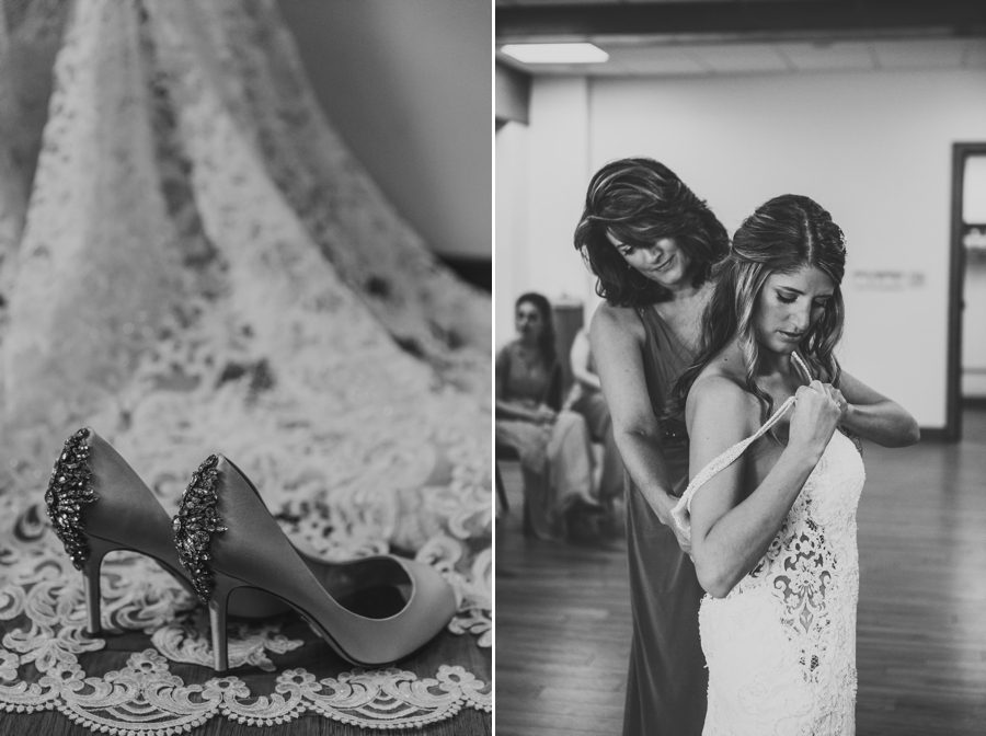 wedding shoes sitting on lace of wedding gown