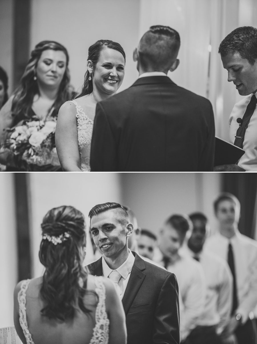 bride and groom smiling at each other during wedding ceremony at The Vue Columbus