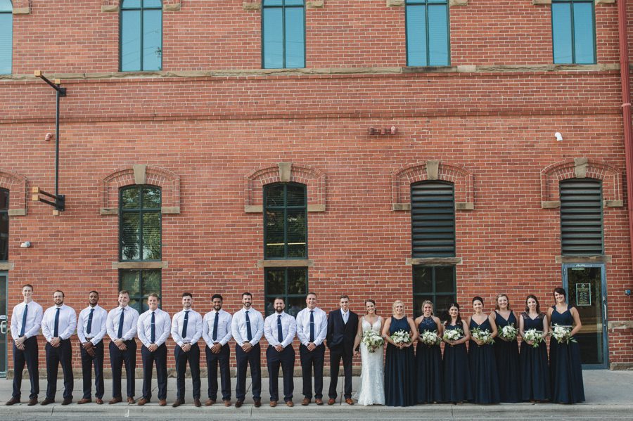 large wedding party wearing navy blue at The Vue Columbus