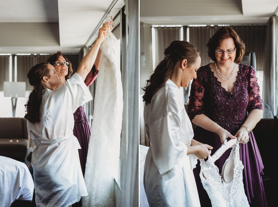 mother of bride helping daughter get dressed