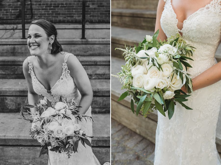 black and white photo of bride laughing while holding bouquet