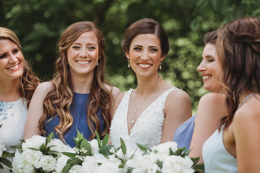 Candid capture by Forget me Knot Photography of Kelsey with her bridesmaids