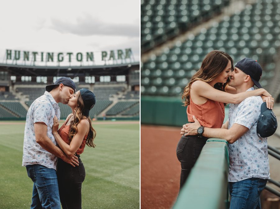 Huntington Park Engagement Photos of engaged couple kissing on baseball field