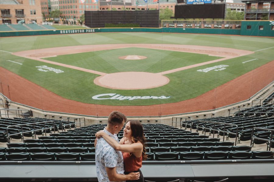engaged couple looking at each other at clippers stadium