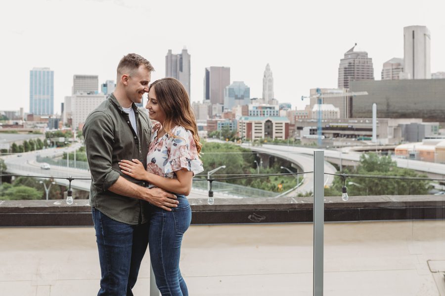engaged couple with Columbus skyline