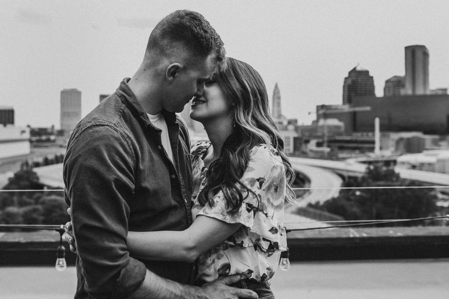 black and white romantic photo of couple about to kiss