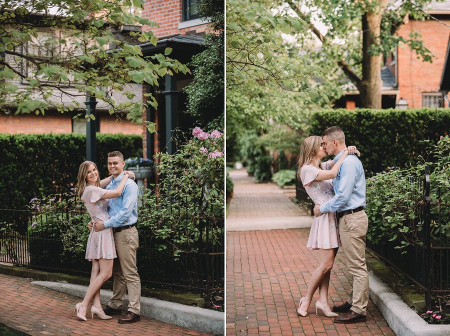 engaged couple kissing in German Village