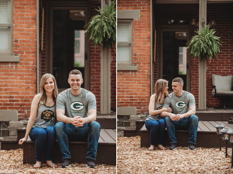 engaged couple wearing Green Bay Packers shirts for engagement session