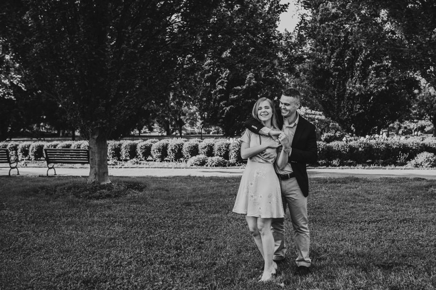 black and white photo of engaged couple dancing at Schiller Park Engagement Photos