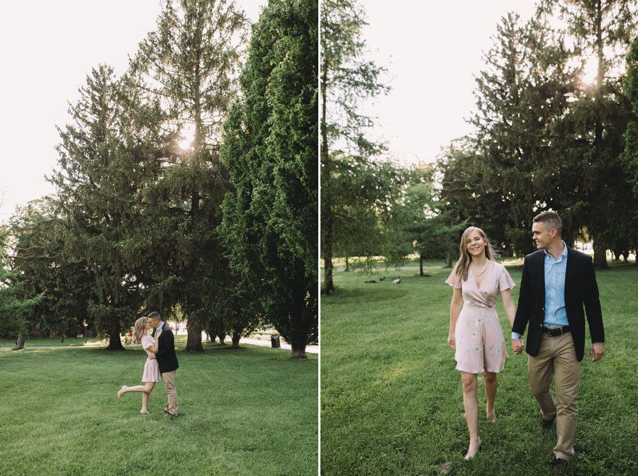 engaged couple kissing with tall pine trees at sunset at Schiller Park Engagement Photos
